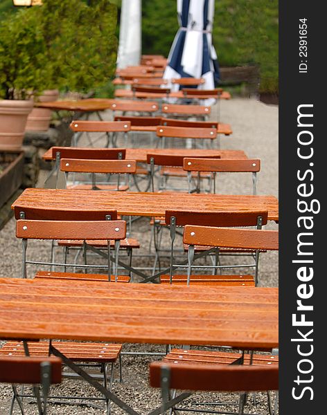 Cafe outdoor tables after the rain. South Bavaria. Cafe outdoor tables after the rain. South Bavaria