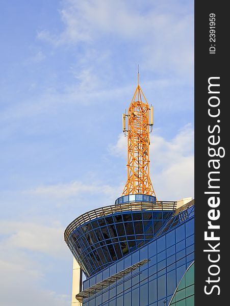 Modern architectural structure over a cloudy sky. Modern architectural structure over a cloudy sky.