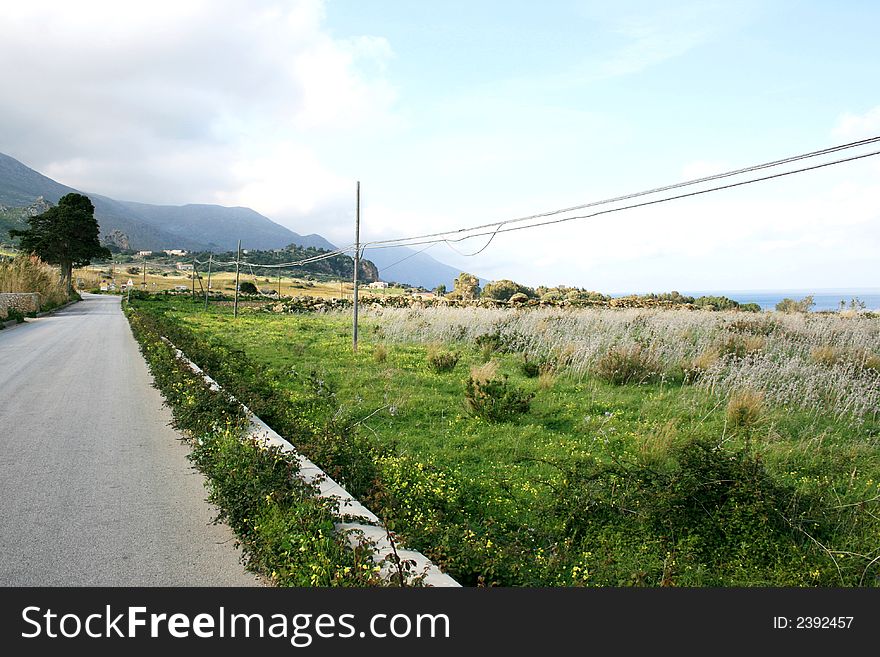 Road, Driving in the green gold Country. Summer travel background. Sicily. Road, Driving in the green gold Country. Summer travel background. Sicily