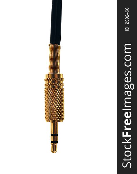 Gold plated audio jack 3.5mm with black cable on white background. Gold plated audio jack 3.5mm with black cable on white background