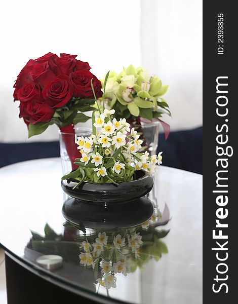 Flower Arrangment of Narcissus, roses and cymbidiums. Flower Arrangment of Narcissus, roses and cymbidiums