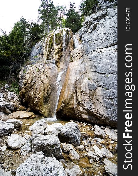 Little waterfall between big rocks