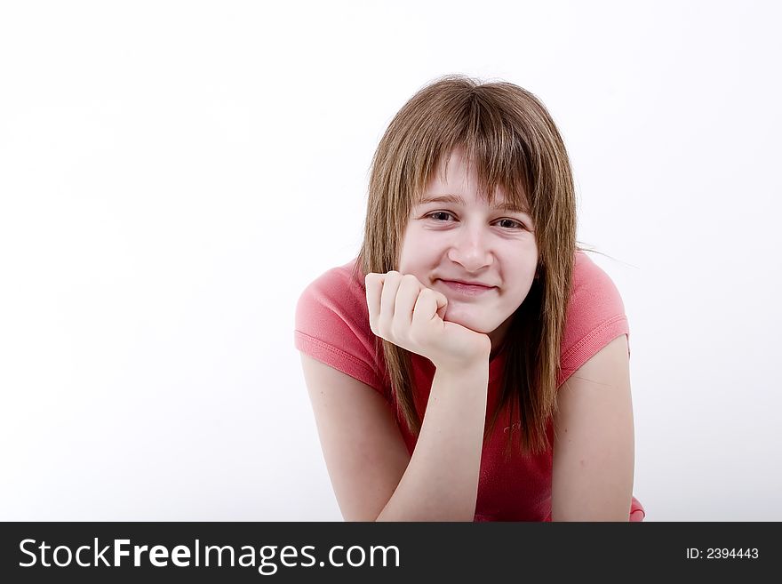 Teen girl smile alone in pink T-shirt