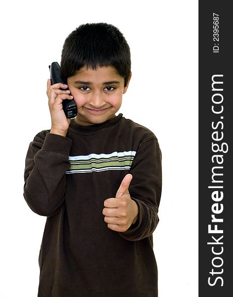 An handsome kid showing thumbs up - concept of success