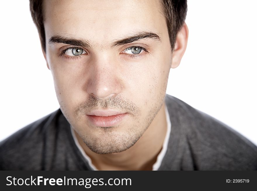 Smiling attractive young man on plain background. Smiling attractive young man on plain background