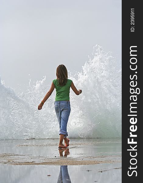 Photo of a girl with wave splash