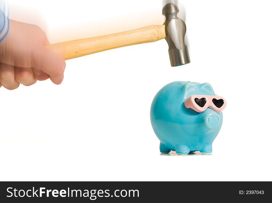 Piggy bank about to get smahed with a hammer. Piggy bank about to get smahed with a hammer
