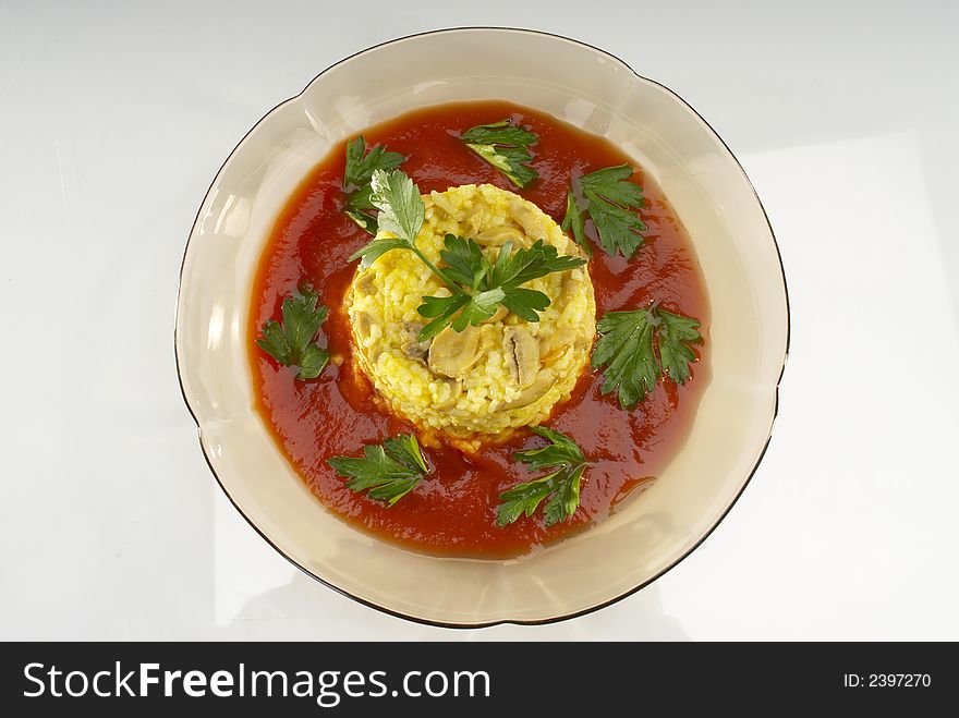 Risotto with tomatoes sauce and parsley