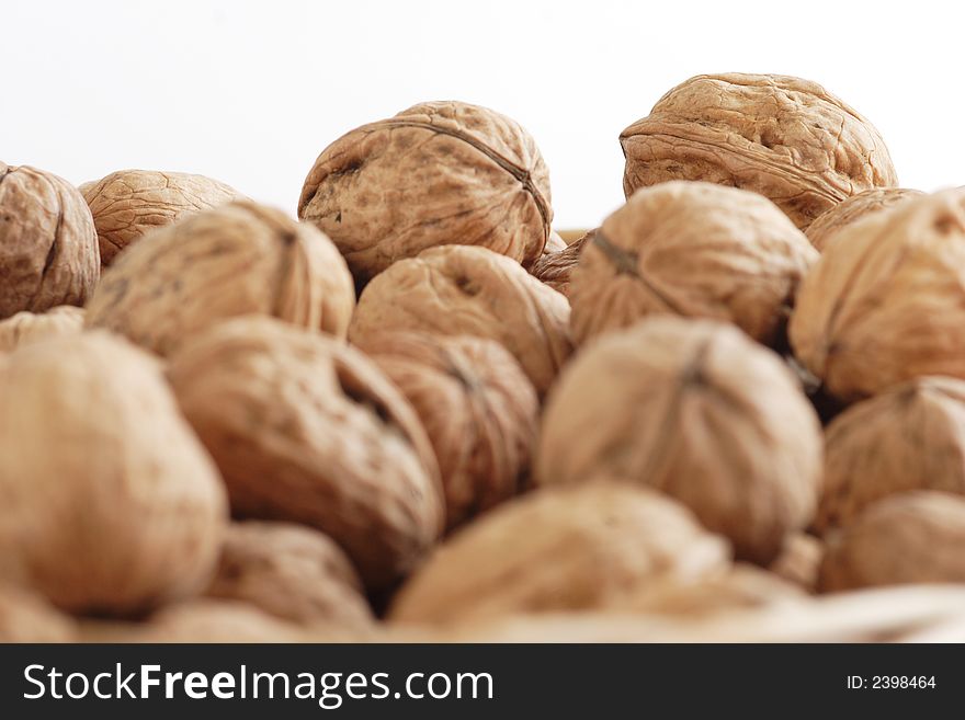 Many of walnuts placed one on other