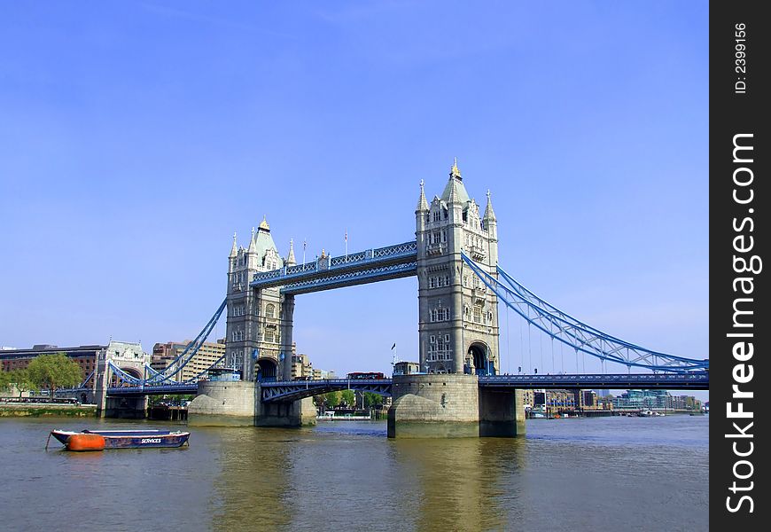 An image of Tower Bridge over the river Thames in Central London,you can see the bridge reflected in the water. An image of Tower Bridge over the river Thames in Central London,you can see the bridge reflected in the water.