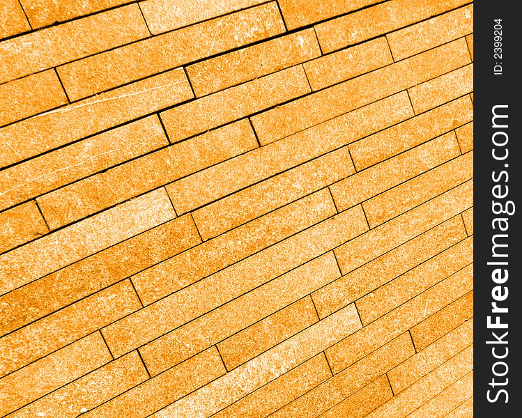 A image of a brick background which was on the pavement. A image of a brick background which was on the pavement.