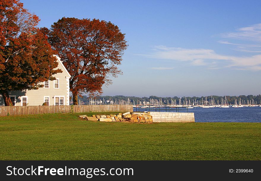 New England harbor with sailboats in autumn. New England harbor with sailboats in autumn