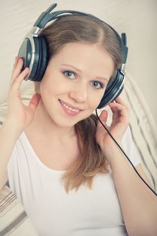 Woman Enjoys Listening To Music On Headphones Royalty Free Stock Photo Woman Enjoys Listening To Music On Headphones Royalty Free Stock Photo
