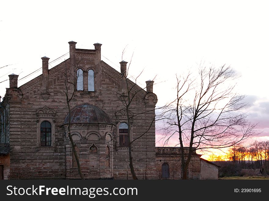 Synagogue sunrise evening cloudy building old granite backside. Synagogue sunrise evening cloudy building old granite backside