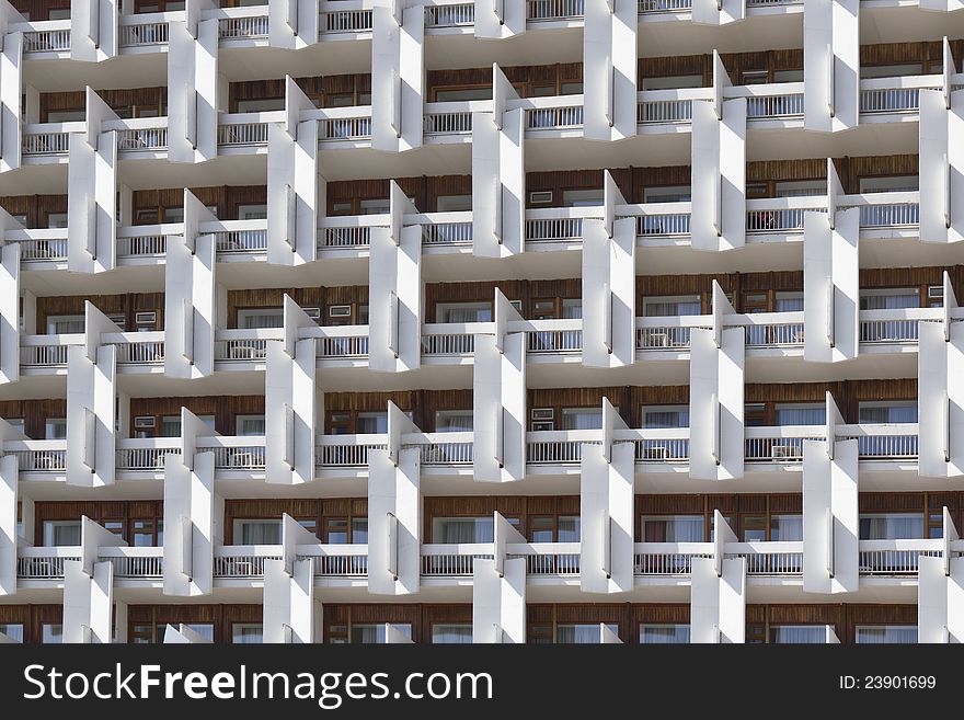 The facade of a multi-storey buildings photographed on a sunny day. The facade of a multi-storey buildings photographed on a sunny day.