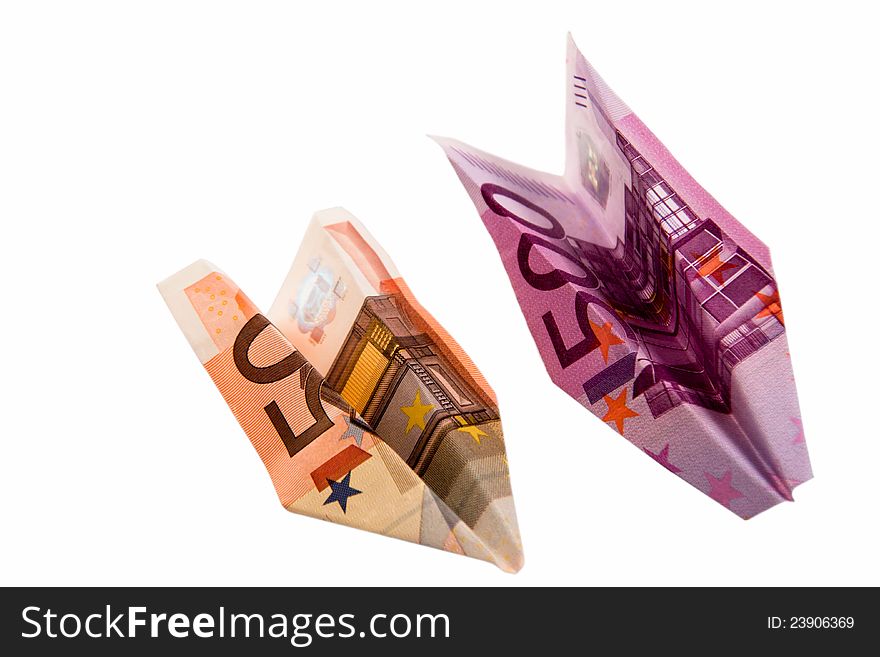 Paper planes from money advantage 50 and 500 on a white background