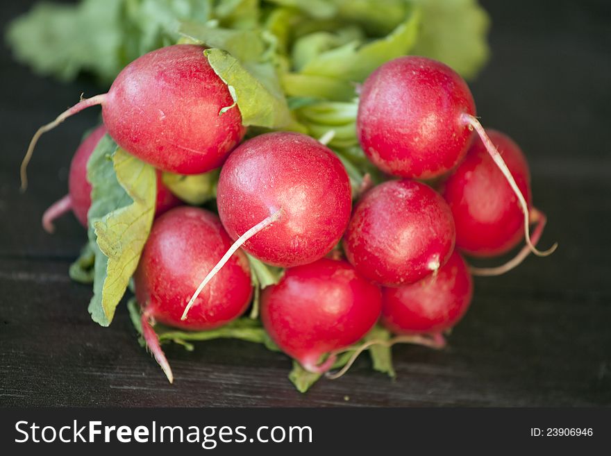 Fresh red radish on a table. Fresh red radish on a table