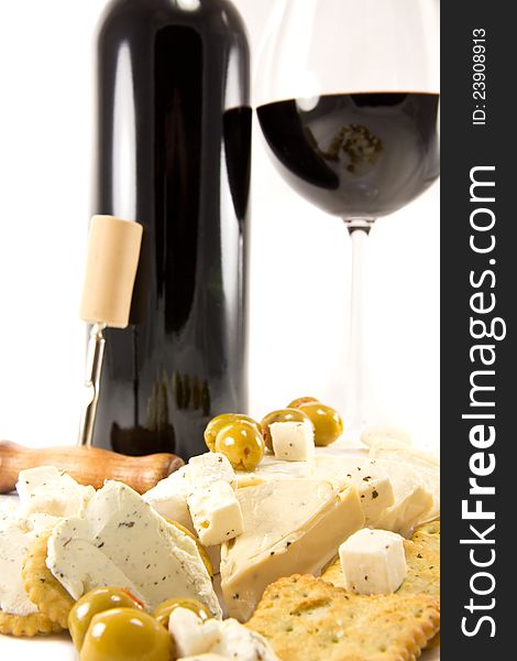 Picture of red wine, crackers, cheese and olives. Picture of red wine, crackers, cheese and olives