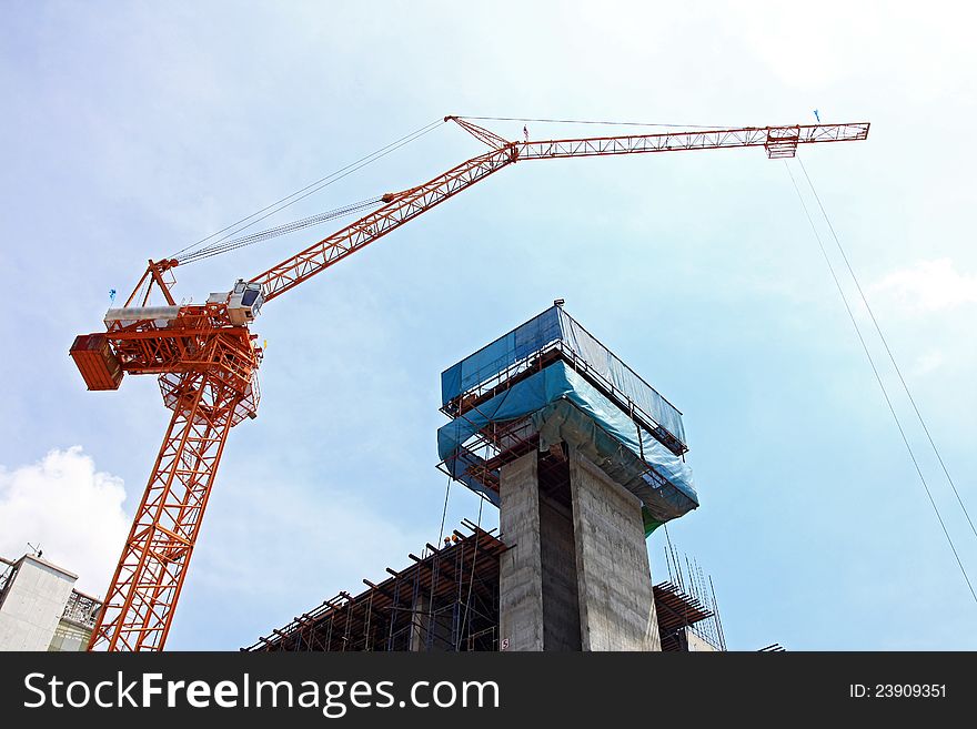 Scaffolding construction site against blue sky