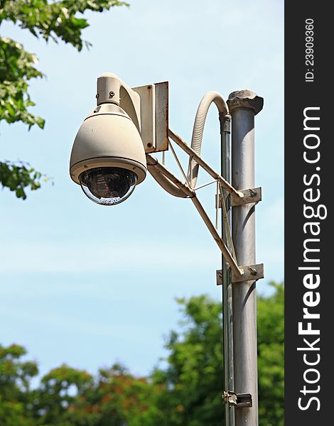 Surveillance Security Camera CCTV on blue sky. Surveillance Security Camera CCTV on blue sky