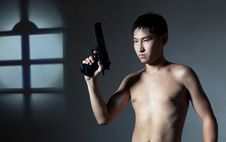 The Guy With A Pistol Stock Photography