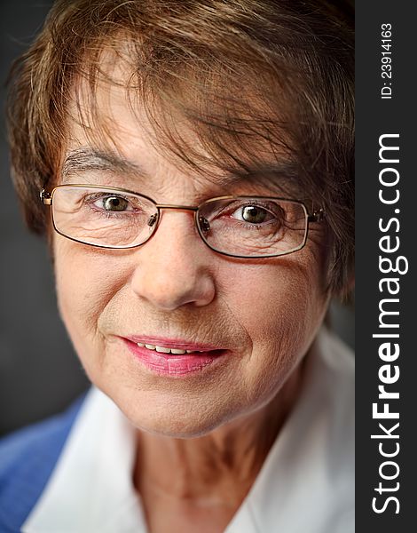 Senior woman portrait,  naturally and with eyeglasses