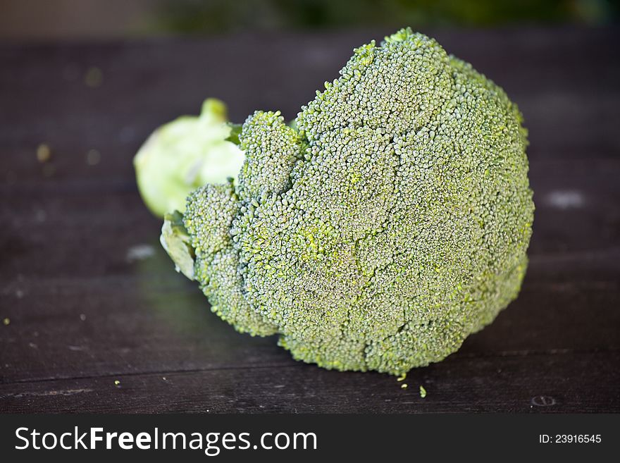 Fresh green broccoli on a wooden table. Fresh green broccoli on a wooden table