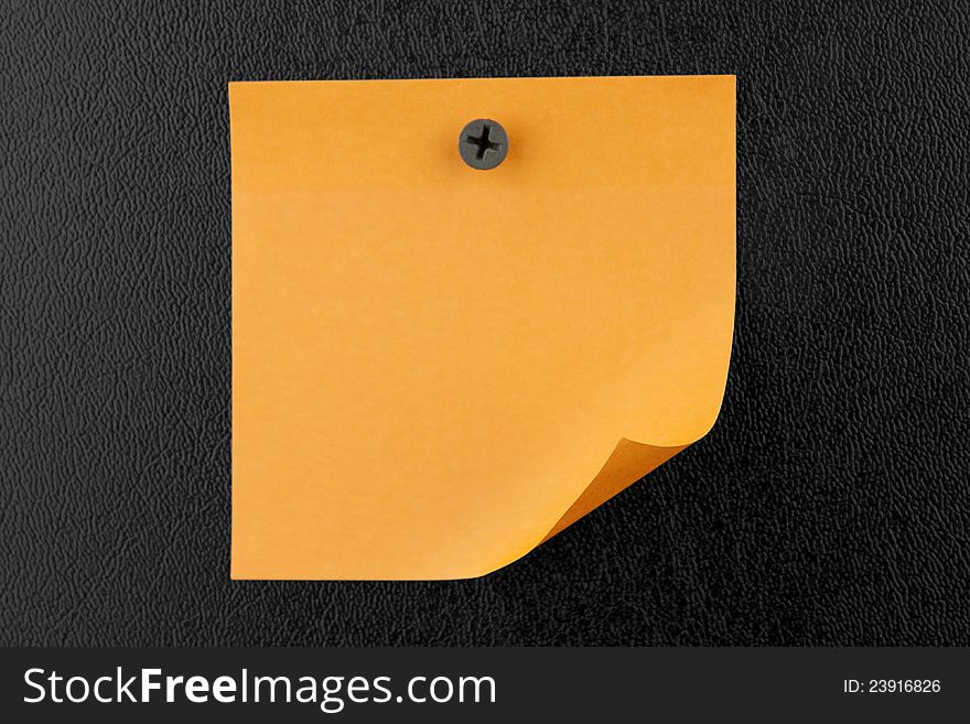 Yellow sticky note on black background