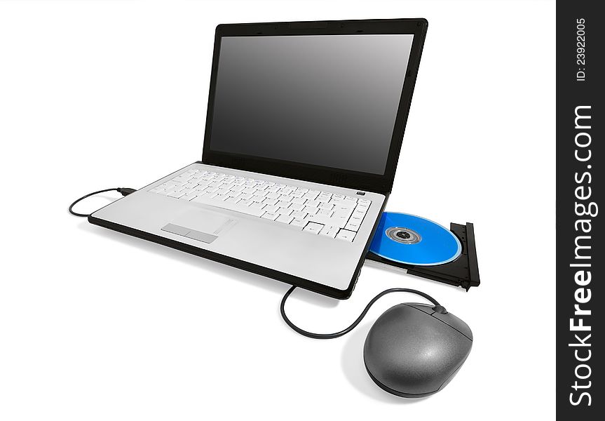Laptop with open compact disc tray and mouse, isolated on white