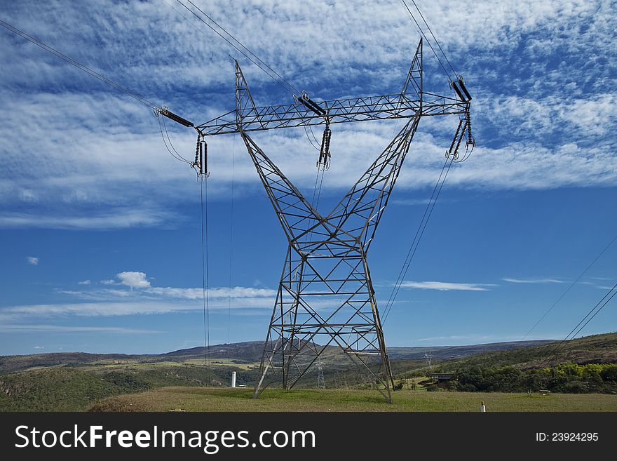 High voltage electric power transmission tower with cables. High voltage electric power transmission tower with cables