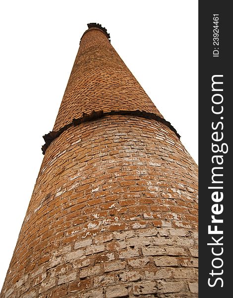 Old orange industrial brick chimney. Old orange industrial brick chimney