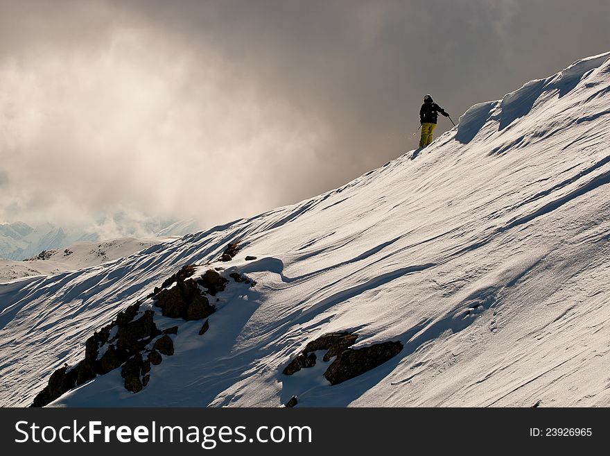 Lady freerider in Caucasus mountains. Lady freerider in Caucasus mountains