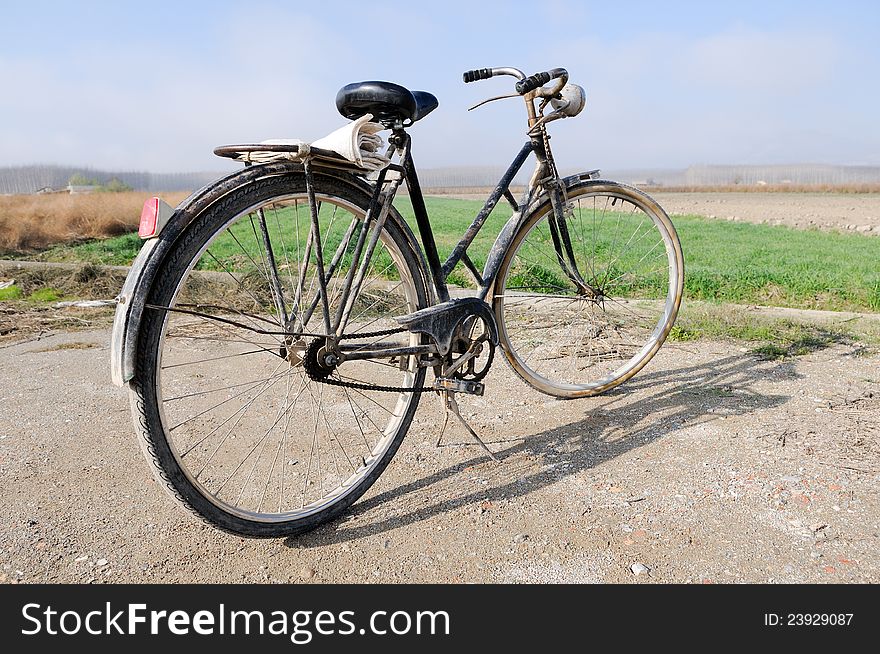 A big old bicycle in the rural environment