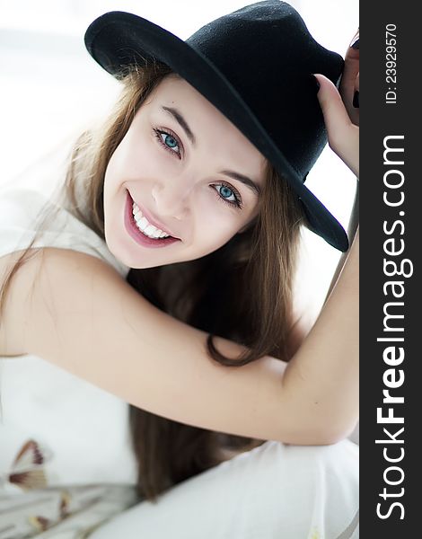 Lifestyle - sensual girl in black bonnet closeup