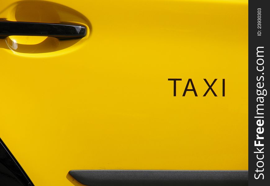 View of Taxi. Yellow and Black colors -typical in the city-. View of Taxi. Yellow and Black colors -typical in the city-