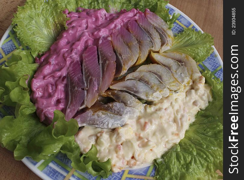 Herring fillet with vegetables in mayonnaise sauce