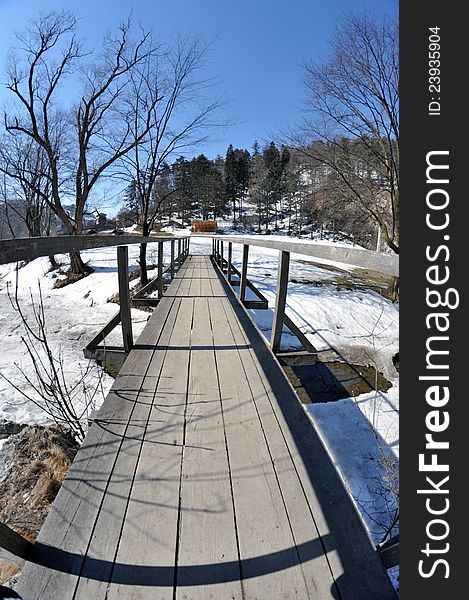 Wooden bridge going to picnic place. Wooden bridge going to picnic place