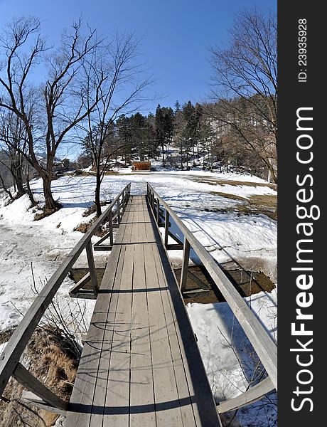 Wooden bridge going to picnic place. Wooden bridge going to picnic place