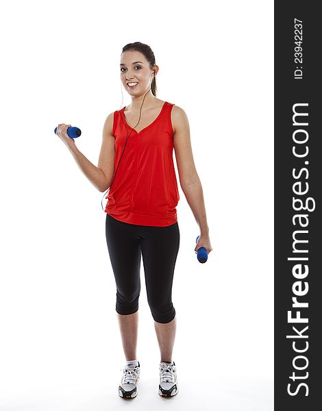 Young fit woman exercising with weights