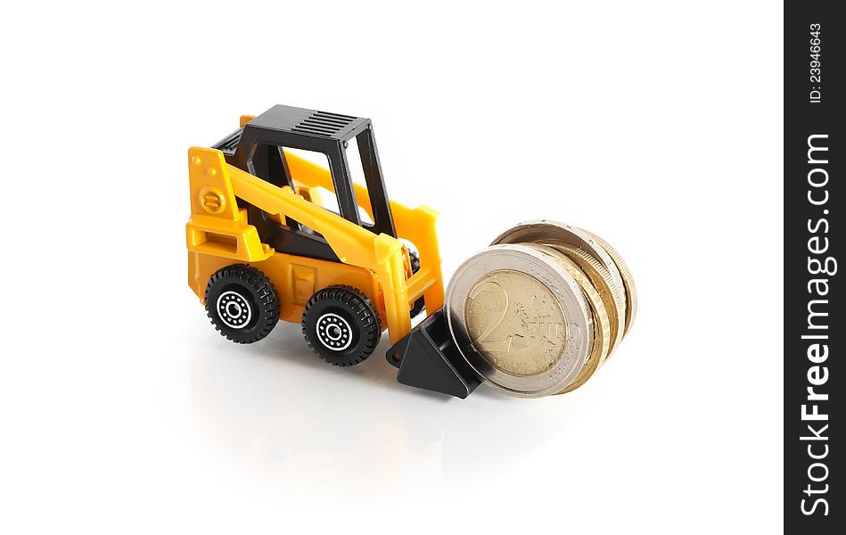 Business concept. Toy forklift truck with European coins on white background. Business concept. Toy forklift truck with European coins on white background