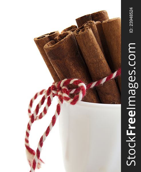 Cinnamon sticks bunch on a white background