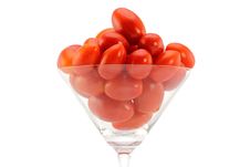 Fresh Cherry/ Cocktail Tomato In A Cocktail Glass Stock Photography