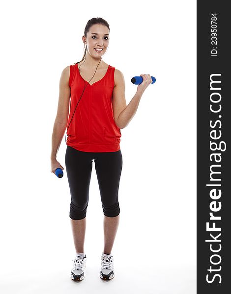 Young fit woman exercising with weights