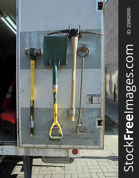Closeup of an open truck backdoor with tools on it. Closeup of an open truck backdoor with tools on it