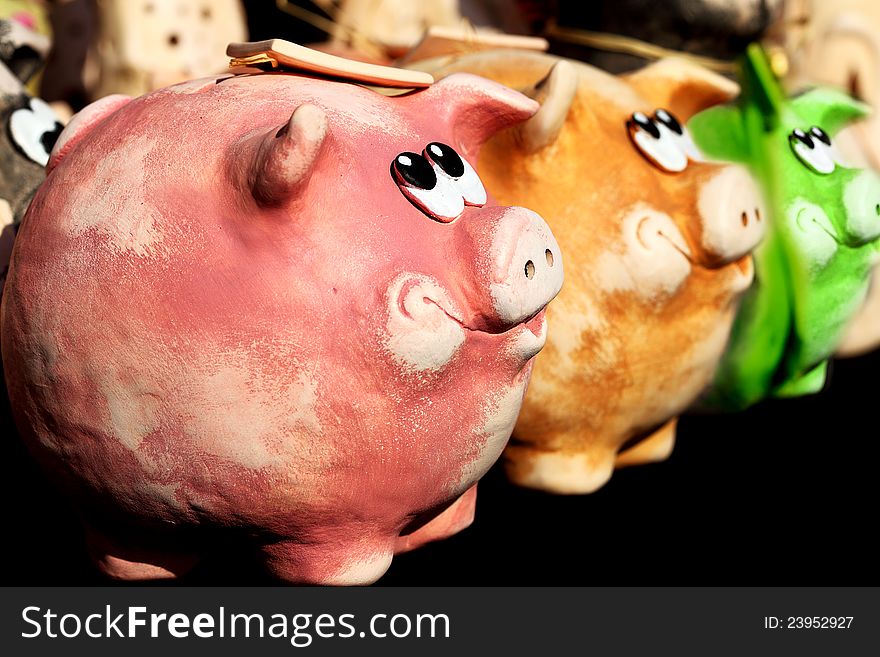 Few nice smiling pigs for save coins and money. Few nice smiling pigs for save coins and money