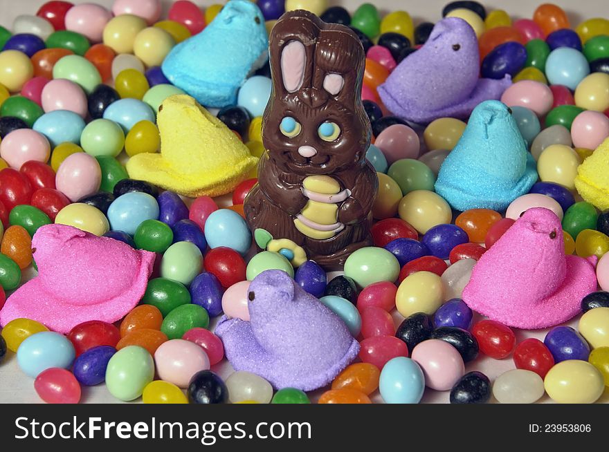 Chocolate bunny and assorted jelly beans,eggs, and marshmallow chicks. Chocolate bunny and assorted jelly beans,eggs, and marshmallow chicks