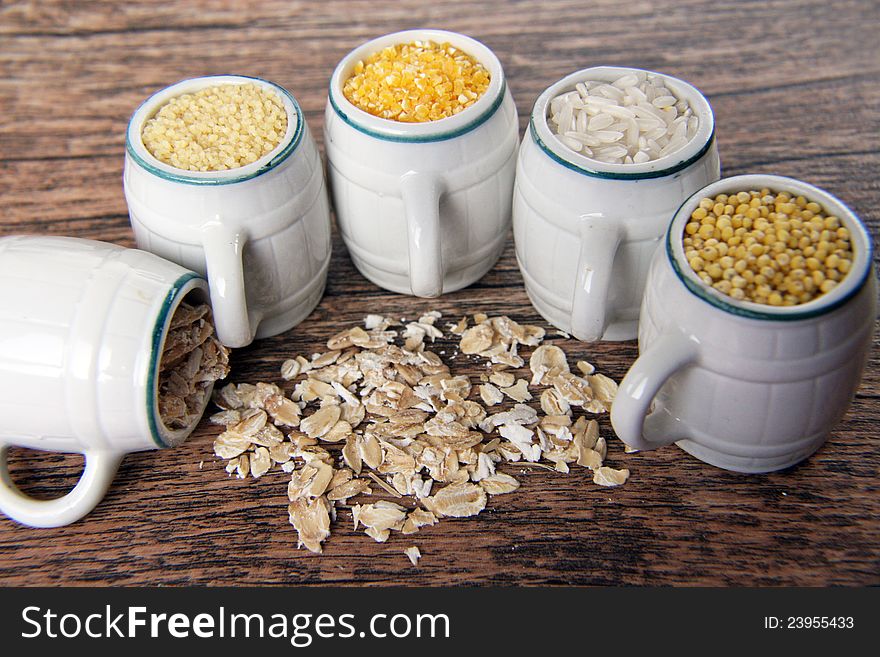 crop (rice and buckwheat, millet and porridge, couscous and  corn) in barrels. crop (rice and buckwheat, millet and porridge, couscous and  corn) in barrels