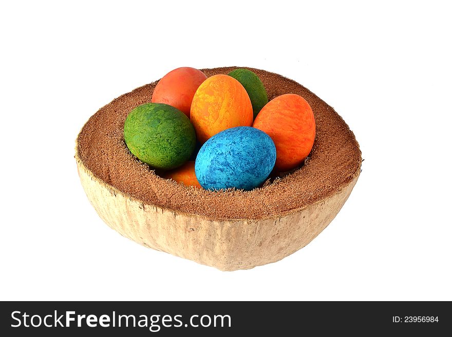 Easter eggs marble colored in coconut shell isolated on white. Easter eggs marble colored in coconut shell isolated on white