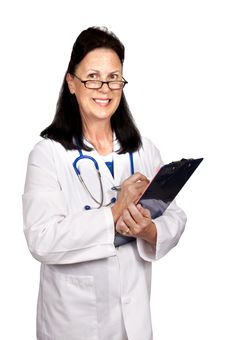 Female Mature Doctor Smiling Holding Clipboard Stock Images Female Mature Doctor Smiling Holding Clipboard Stock Images