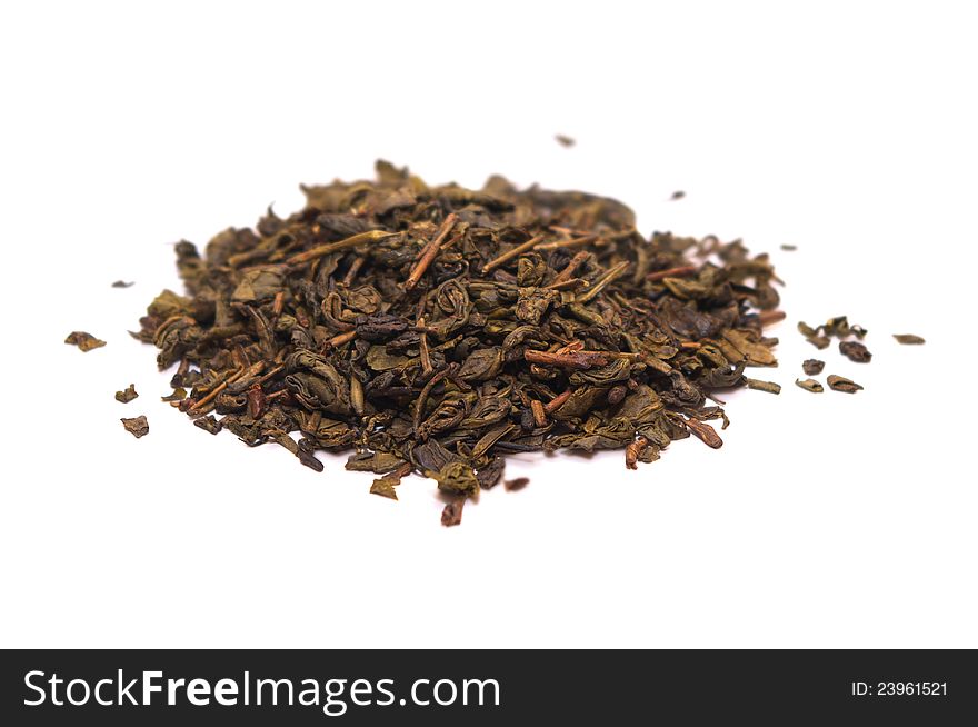 Photo of the Dry green tea on white background